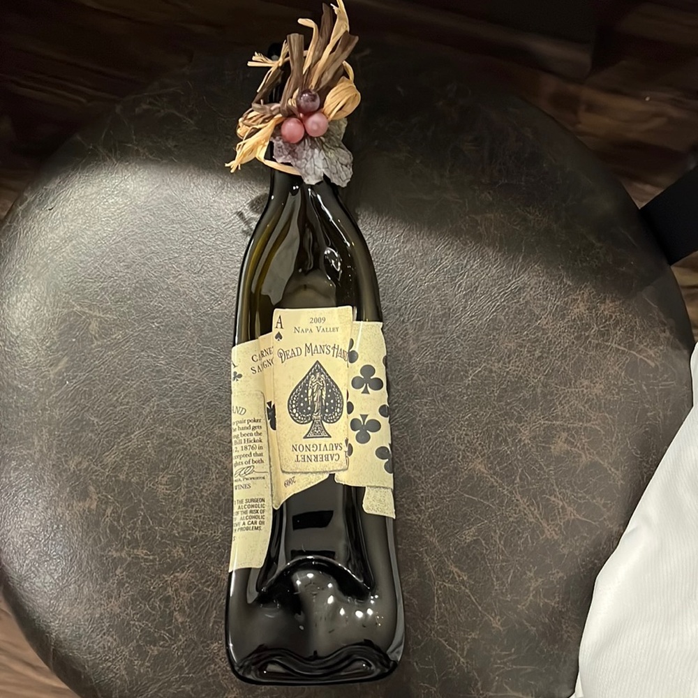 Wine Bottle Spoon Rest.  Melted bottle.  2009 Napa Valley Dead Man’s Hand Cab